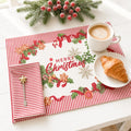 Tovaglietta natalizia in cotone a righe rosse con fiocchi, vischio e scritta Merry Christmas, apparecchiata per colazione